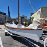 trailered wooden boat built by person selected best up and coming boatbuilder