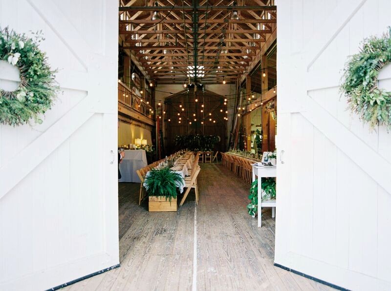 double doors open revealing an event setup inside the watercraft center